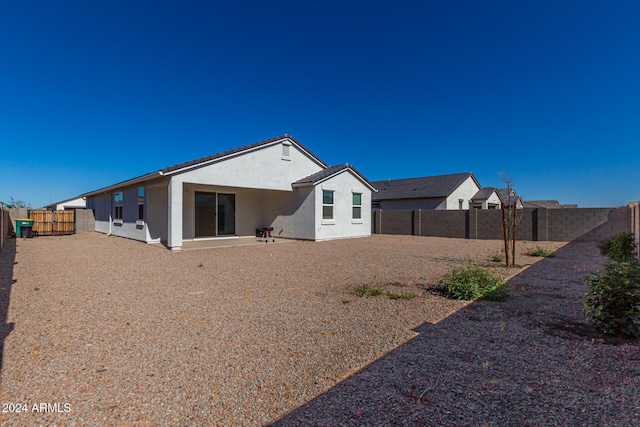 back of house featuring a patio