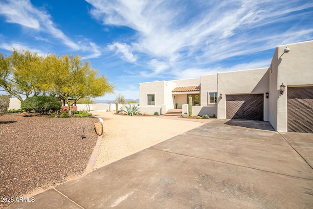 30505 N 136th St, Scottsdale, AZ 85262 - southwest-style home featuring a tile roof, stucco siding, concrete driveway, and a garage