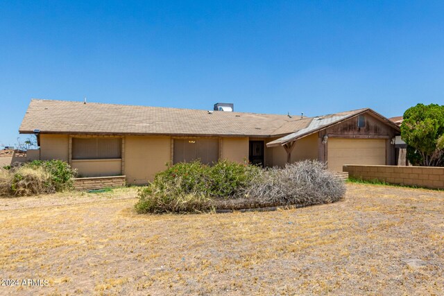 ranch-style house with a garage