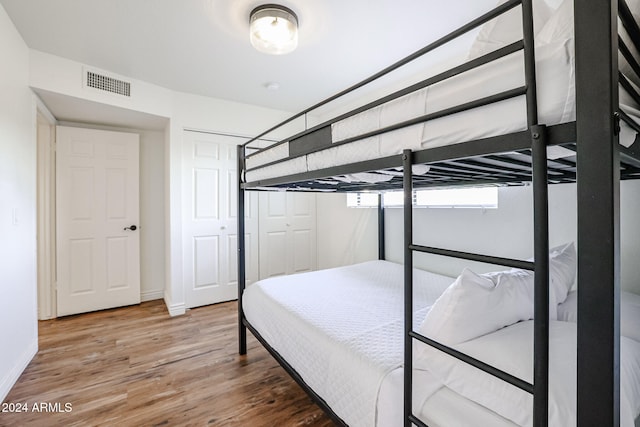 bedroom featuring hardwood / wood-style floors