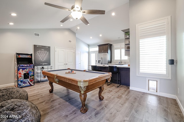 game room with light wood-type flooring, high vaulted ceiling, ceiling fan, and pool table