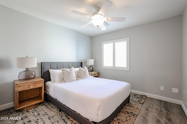 bedroom featuring ceiling fan and wood-type flooring