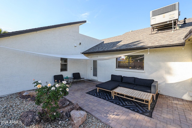 view of patio featuring central air condition unit and an outdoor hangout area