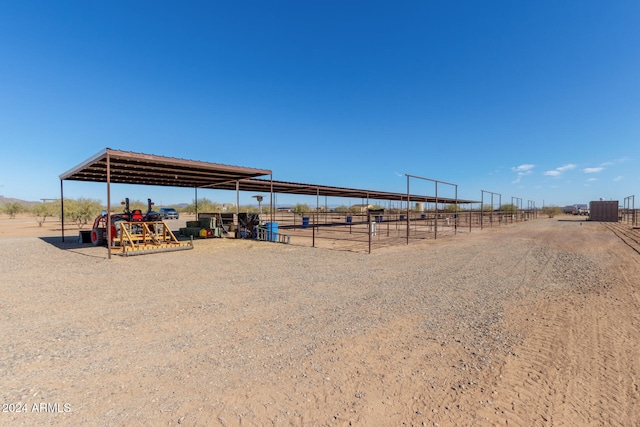 view of yard with a rural view