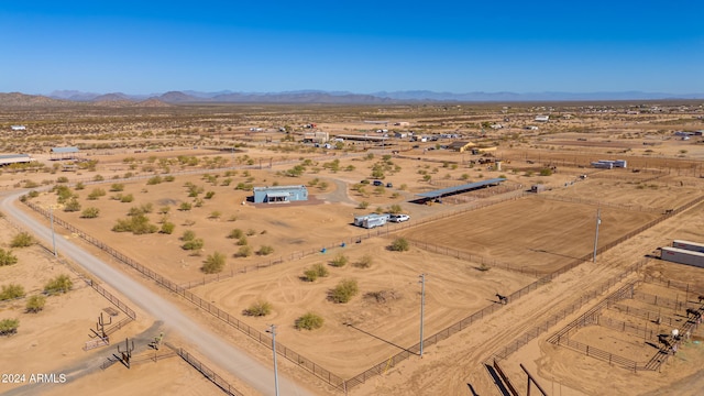 aerial view with a mountain view and a rural view