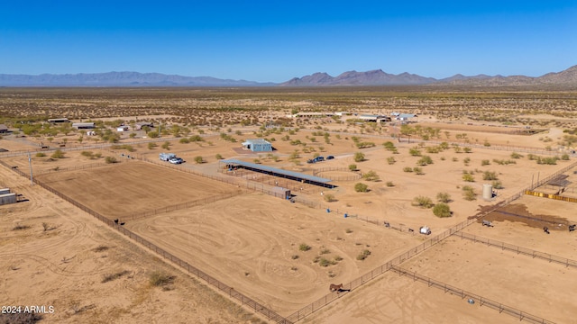 drone / aerial view featuring a mountain view