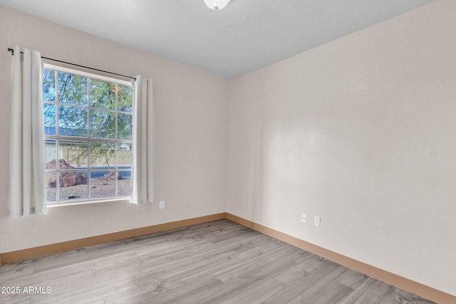 empty room featuring light wood-type flooring