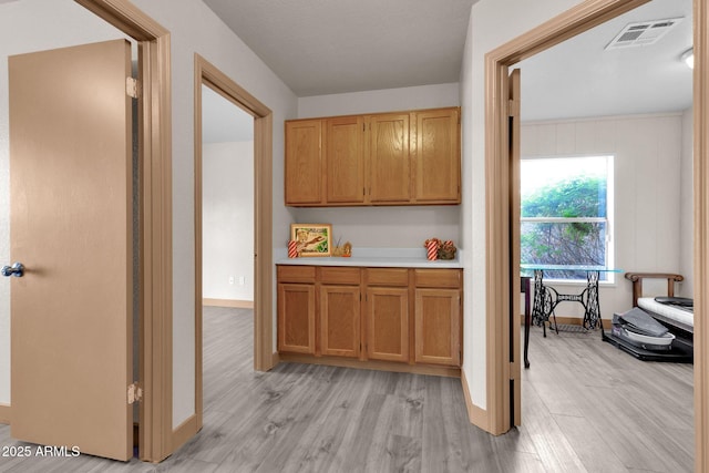 kitchen with light wood-type flooring