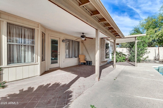 view of patio / terrace featuring ceiling fan