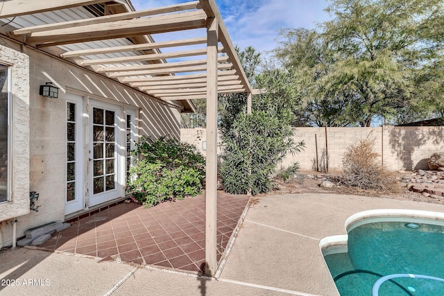 view of patio with a fenced in pool