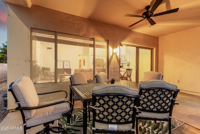 view of patio featuring ceiling fan and outdoor dining area