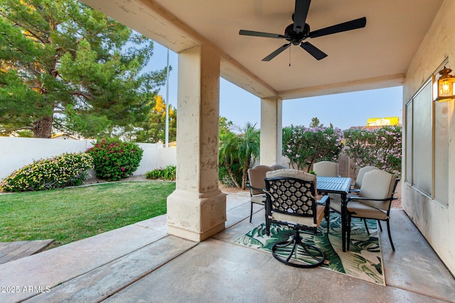 view of patio / terrace featuring outdoor dining space and ceiling fan