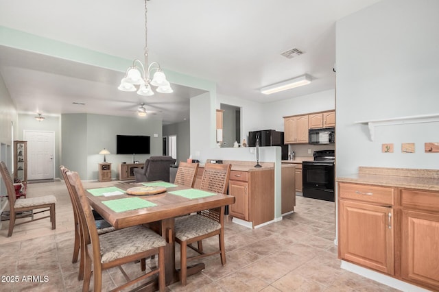 dining area featuring light tile patterned floors and a notable chandelier