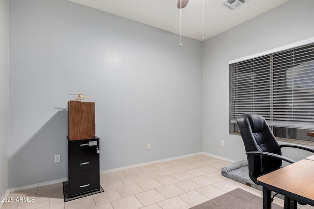 office area featuring light tile patterned floors and ceiling fan