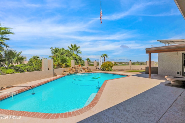 view of pool featuring a patio