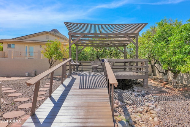 wooden deck with a pergola