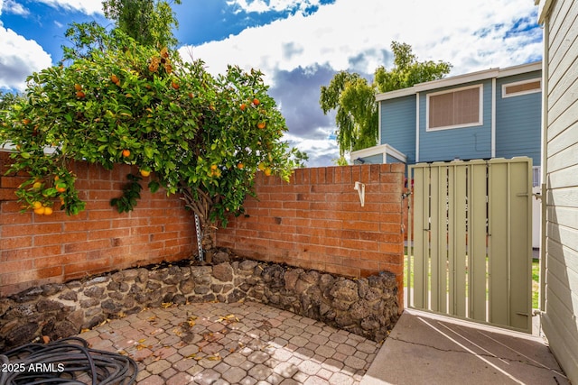 view of patio / terrace with a gate and fence private yard