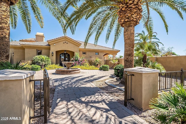 view of patio featuring fence