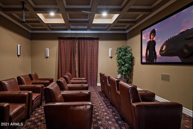 carpeted cinema room with coffered ceiling, baseboards, crown molding, and beamed ceiling