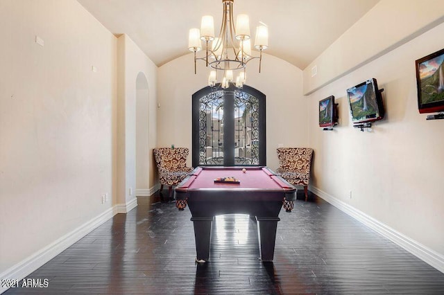 rec room featuring arched walkways, wood-type flooring, a chandelier, french doors, and baseboards