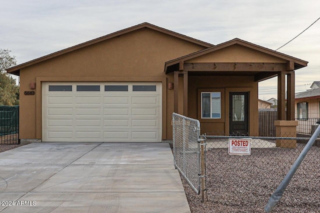 ranch-style home with a garage