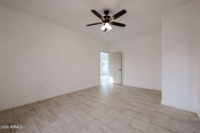 unfurnished room featuring ceiling fan