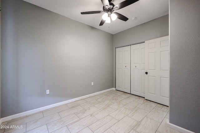 unfurnished bedroom with a closet and ceiling fan