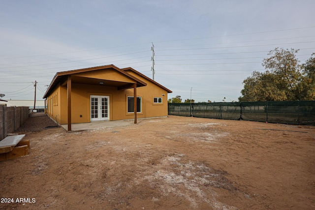 rear view of house with french doors