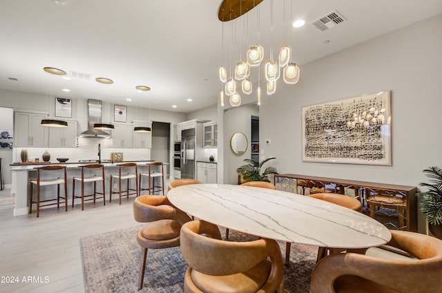 dining room featuring light hardwood / wood-style flooring