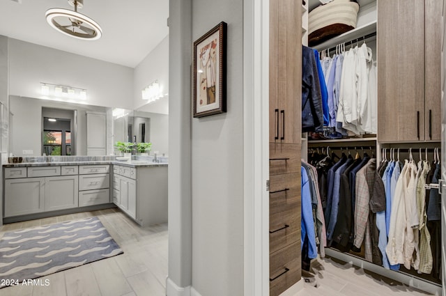 bathroom featuring hardwood / wood-style flooring and vanity