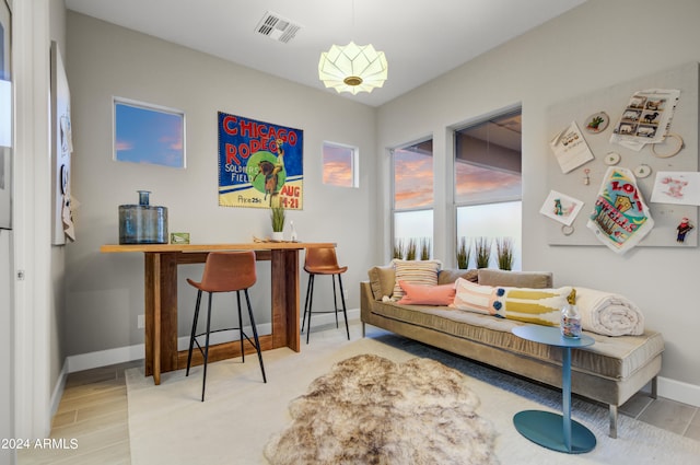 living area featuring hardwood / wood-style floors