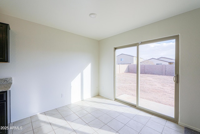 interior space featuring light tile patterned floors