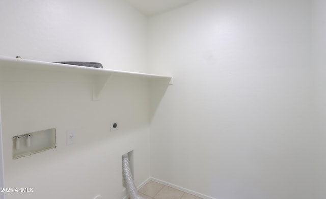 laundry room with light tile patterned floors and hookup for an electric dryer