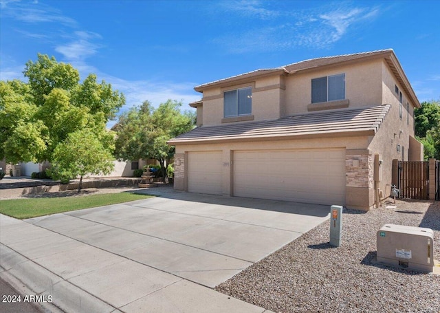 front of property featuring a garage