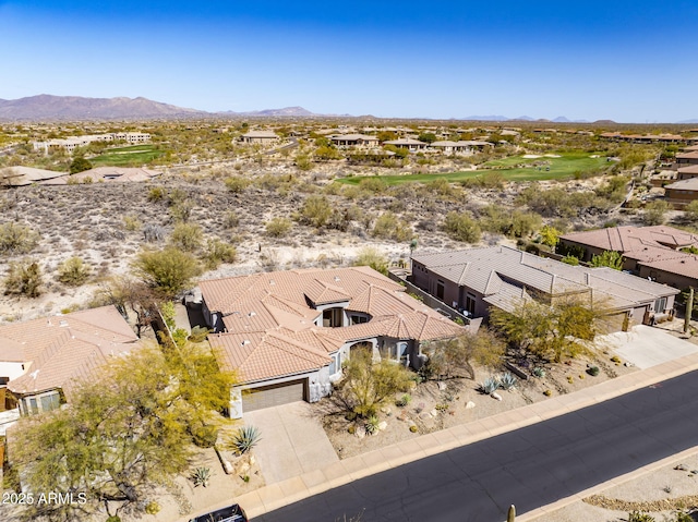 drone / aerial view featuring a mountain view and a residential view