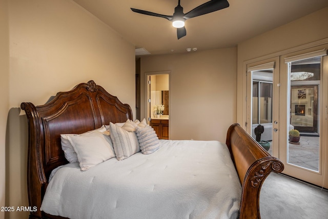 bedroom featuring carpet flooring, access to exterior, multiple windows, and french doors