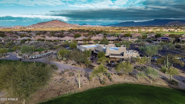 bird's eye view with a mountain view and a residential view