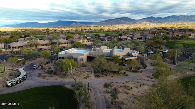 bird's eye view featuring a mountain view and a residential view