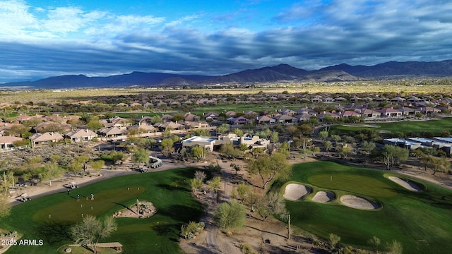 birds eye view of property with a residential view, a mountain view, and golf course view