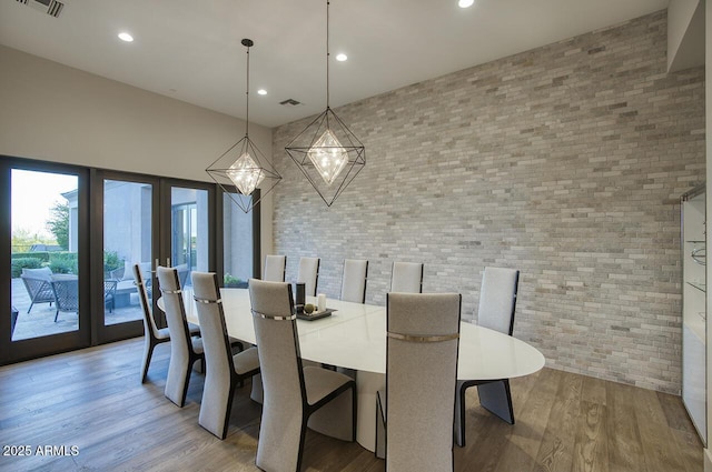 dining room with light wood-style floors, french doors, recessed lighting, and visible vents