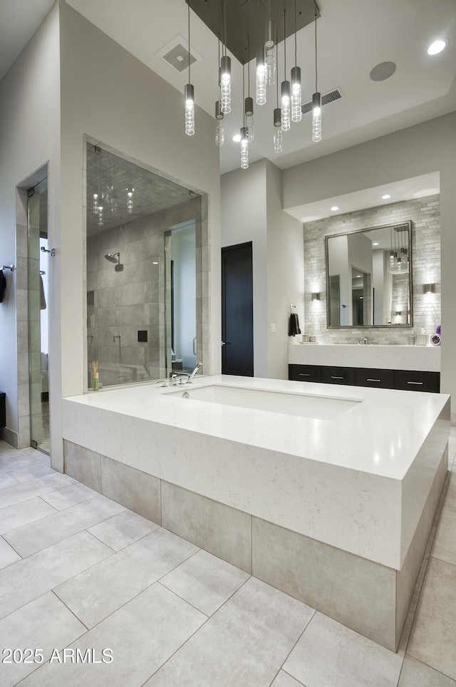 bathroom with visible vents, vanity, recessed lighting, tile patterned floors, and a stall shower