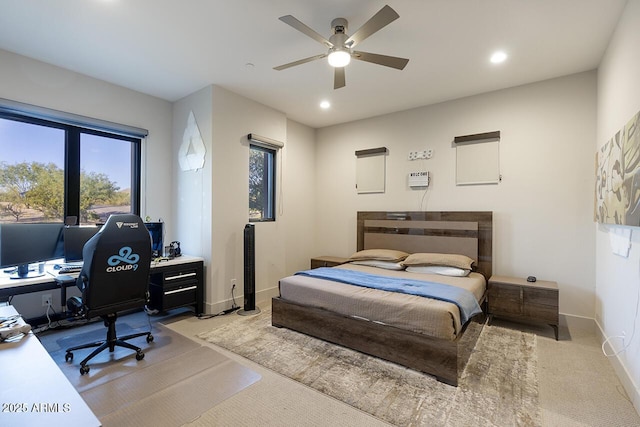 bedroom featuring baseboards, recessed lighting, ceiling fan, and light carpet