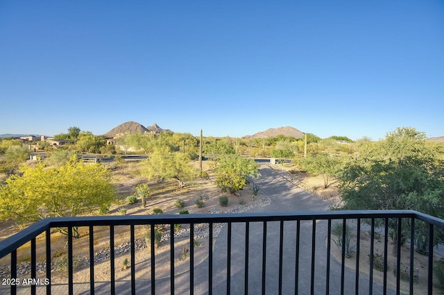 balcony featuring a mountain view