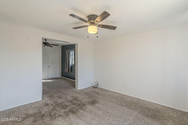 unfurnished room with carpet floors