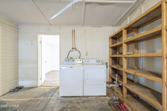 laundry room with washer and dryer and laundry area