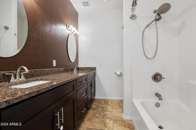 bathroom with dual bowl vanity,  shower combination, and tile patterned flooring