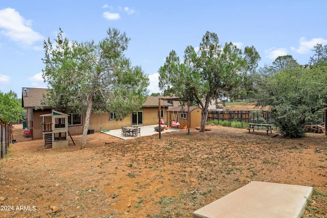 view of yard with a patio area