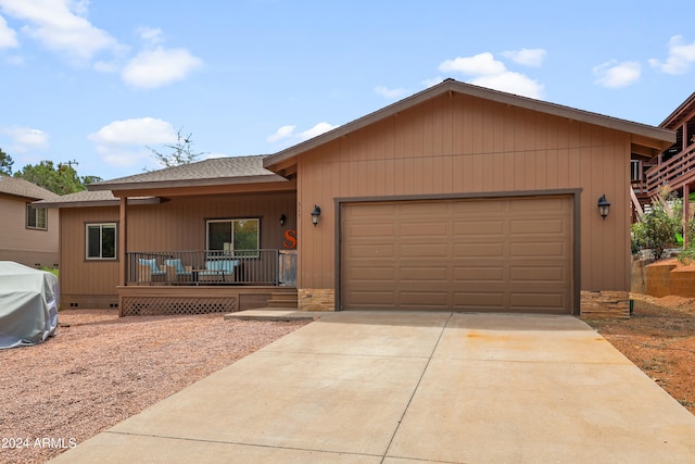 ranch-style house featuring a garage