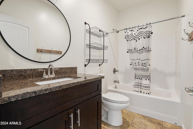 full bathroom featuring shower / bath combo, toilet, vanity, and tile patterned flooring