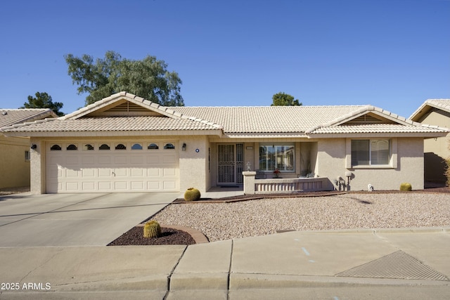 ranch-style house featuring a garage